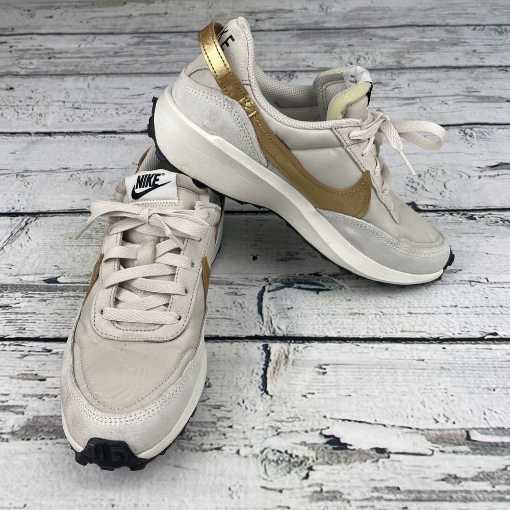 Nike Women's Athletic Shoes in White and Gold